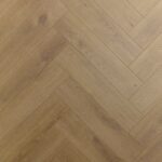 Sol stratifié bâton rompu 12 mm - Chêne Amande 529